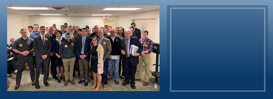 Senator Jill Vogel with local supporters inside a building